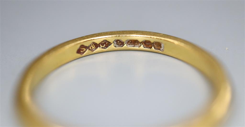 A 22ct gold wedding band, size K, 2.4 grams.